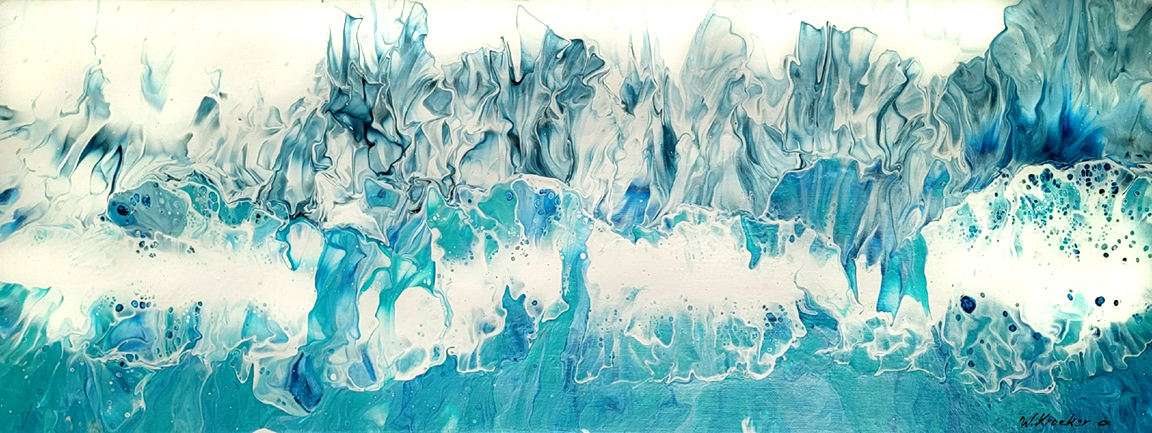 Acrylic pour depicting waves on an ocean beach.